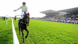 Burrows Saint delivers Irish Grand National glory in style for Mullins at last