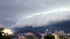 Severe  storm sweeps into Sydney at rush hour