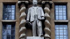 Oxford college accused of bowing to donors to keep Rhodes statue