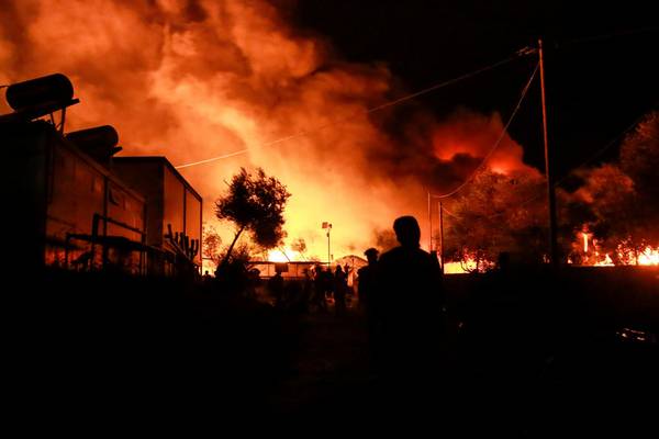 Fires force thousands to flee from Greek migrant camp