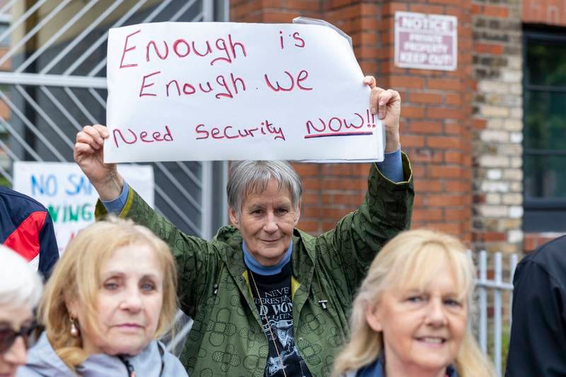 ‘It is becoming a living hell’: residents of Dublin housing complex protest against anti-social behaviour