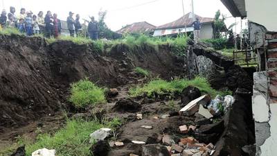 Bali landslides kill 12 people as torrential rain hits Indonesia