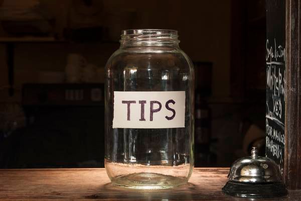 What is the fairest way to leave a tip at a restaurant?