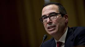 Trump treasury pick clashes with Democrats over bank he chaired