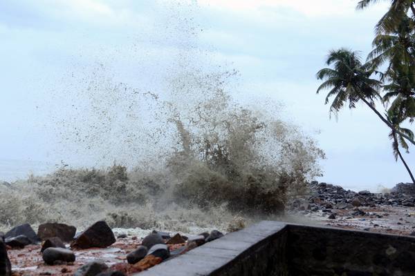 Cyclone batters Indian coast killing 14, with many fishermen feared trapped at sea