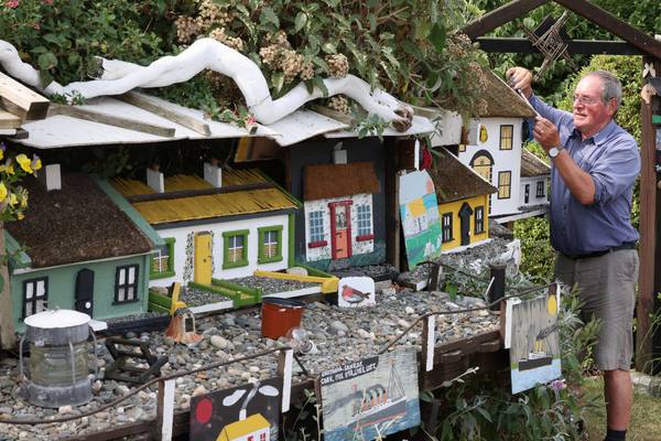 Louth man delights tourists and locals with models of thatched cottages