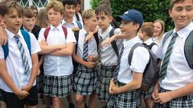 Boys wear skirts to school in protest over shorts ban