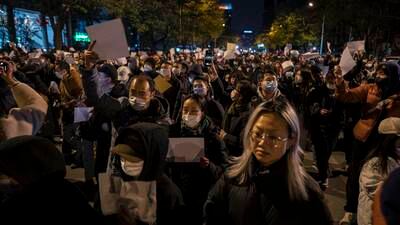 Covid-19 cases in China hit new record high after weekend of protests