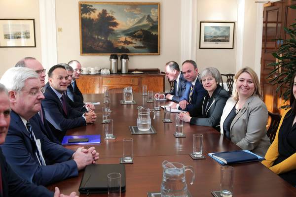 Taoiseach has no answer for Joan Burton on lack of women in North talks photo
