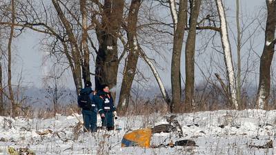 Russian investigators search for clues after fatal plane crash