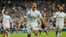 Javier Hernandez strikes at the death to send Real through