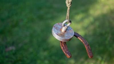 Magnet fishing: ‘An engagement ring, a gold coin – the crowd willed the fisherman to draw something valuable from the water’