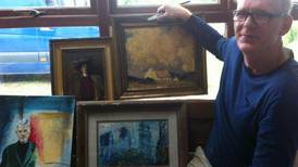 Man cutting hedge finds stolen paintings worth €180,000