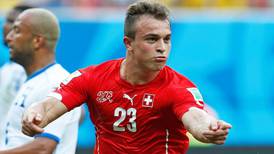 Shaqiri comes alive to guide Swiss through