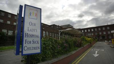 Hospital vigil held in protest at removal of medical cards
