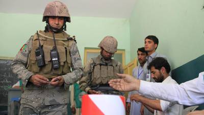 Afghans vote again for president as Taliban threats loom