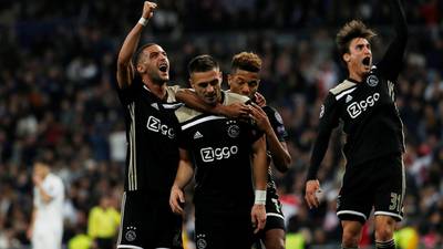 Ajax storm Bernabeu to send champions Real Madrid crashing out