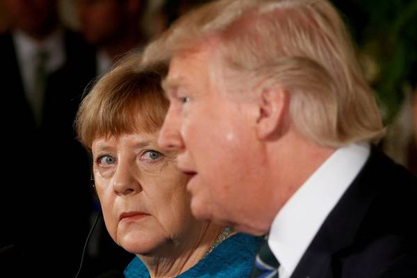 Sober Merkel-Trump meeting looms after Macron bromance