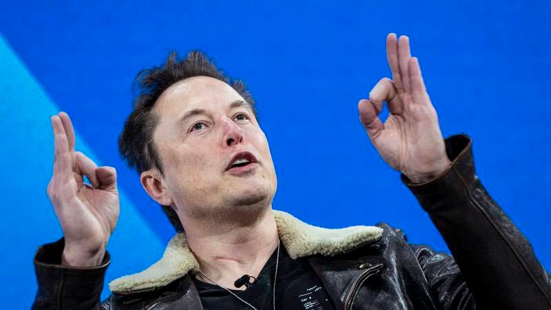 Musk lets fly at fleeing advertisers in profanity-laden interview