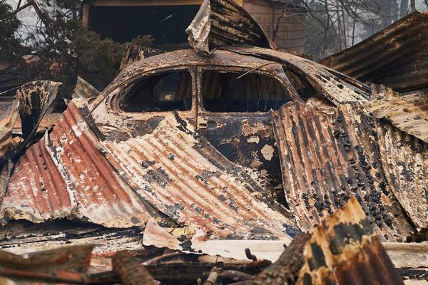 ‘We realised we can’t stop this’: locals flee inferno in Australian village of Wingello