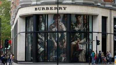 Burberry cuts product lines as profits fall by a quarter