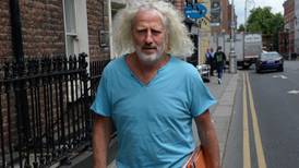 Dáil wear: Mick Wallace and  Boyd Barrett display uniforms of choice