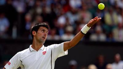Djokovic eases into stride at Wimbledon