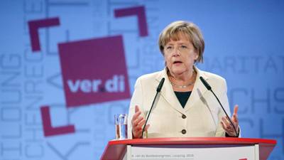 Europe must act together on refugee crisis,  Merkel says
