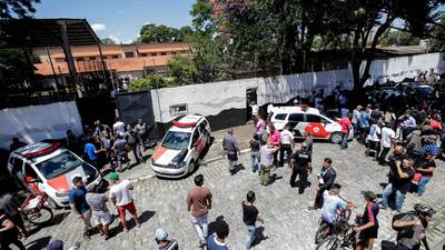 Ten dead including two gunmen after school shooting in Brazil