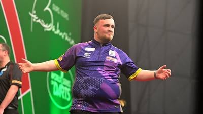 Luke Littler throws nine-darter as he wins first PDC title at Bahrain Masters