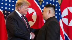 Trump and Kim shake hands to kick off second summit