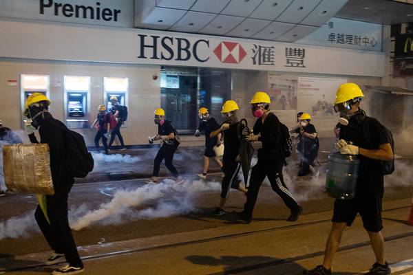 China stands by Hong Kong leader Carrie Lam and police