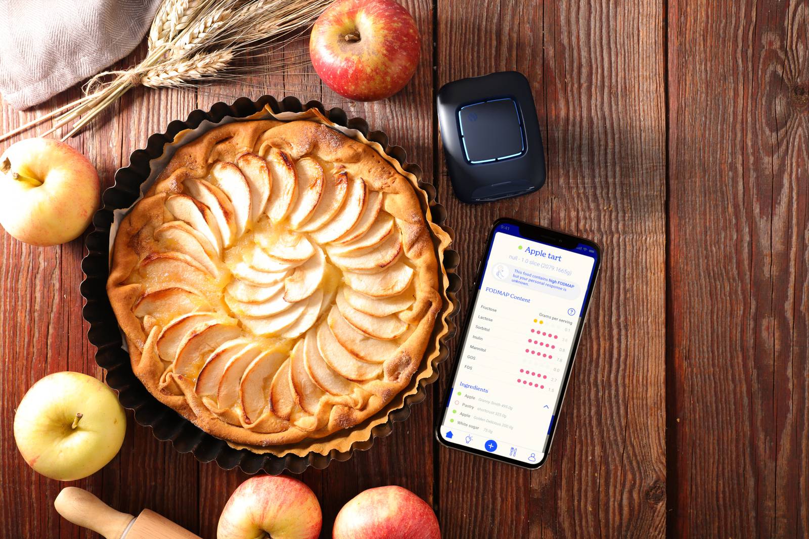 The FoodMarble Aire 2 device pictured alongside the FoodMarble app and an apple pie