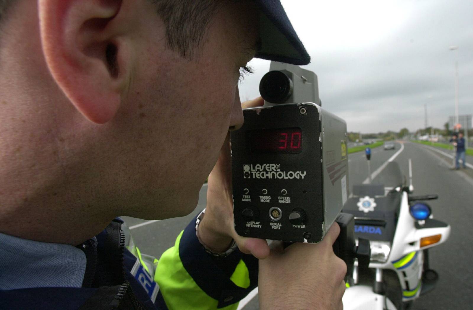 Photograph: Cyril Byrne
Garda Mark Connaughton from the Regional Traffic Division, Dublin Castle operating a speed lazer camera on the  Belfield Road, Stillorgan, yesterday at the start of the penalty points for speeding operation.