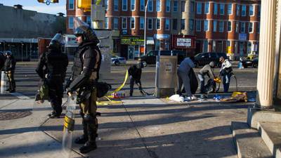 Baltimore smoulders after riots following Freddie Gray’s funeral