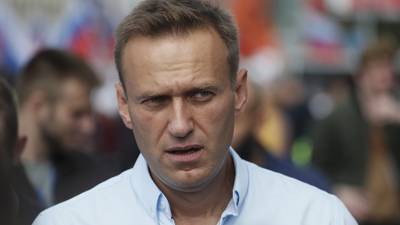 Alexei Navalny still in coma but improving, say German doctors