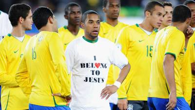 Faith a rite of passage to world domination for devout Brazilians