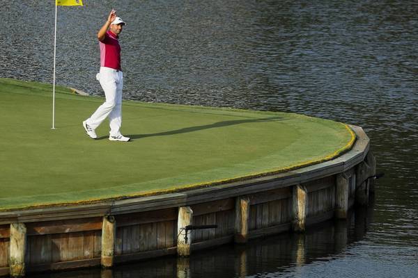 Rory McIlroy rescues opening round with late birdies