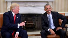 Obama and Trump leave insults behind in awkward first encounter