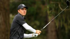 Jordan Spieth among the leaders at a soggy Pebble Beach