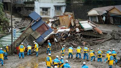 Japan launches huge rescue effort after mudslide leaves two dead and 20 missing