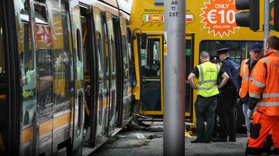 Eight people hurt after tour bus crashes into Luas tram