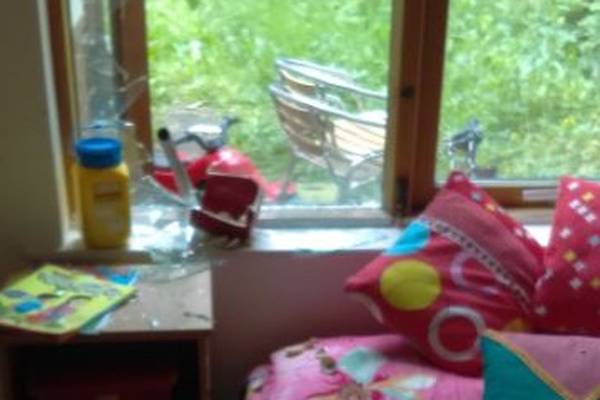 Baby avoids injury after bedroom window smashed in alleged racist attack