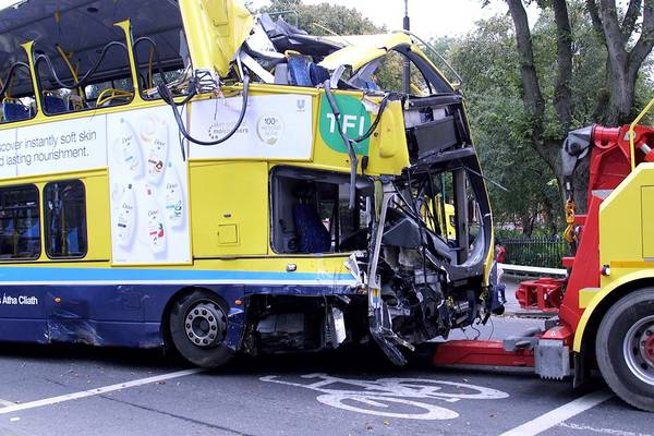Two remain in serious condition in hospital after bus and car collide