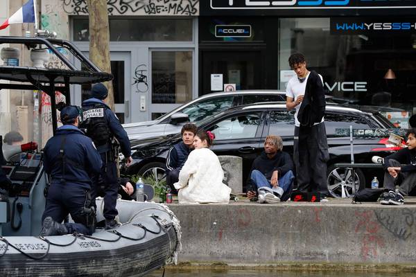 Paris bans drinking by the Seine after crowds celebrate easing of lockdown