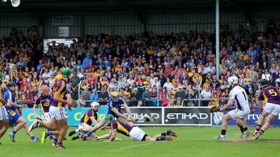 Champions Clare survive huge scare against  Wexford to force replay