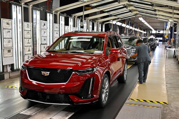 GM to restart production as BMW warns of long-term Covid impact