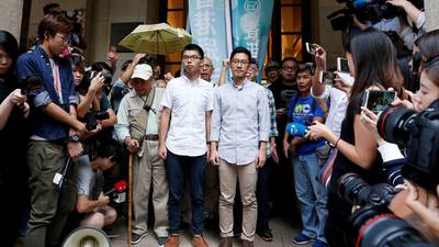 Hong Kong frees two pro-democracy activists on bail