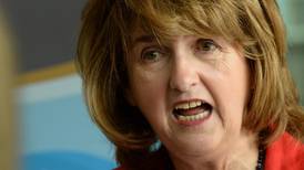 Joan Burton admits to tensions between Fine Gael and Labour