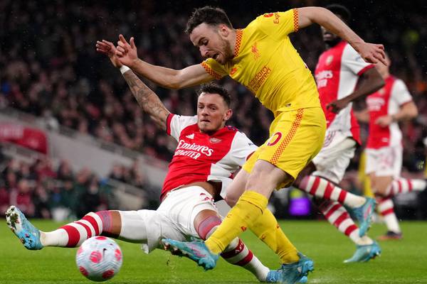 Liverpool roll with the punches to overcome Arsenal